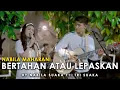 Download Lagu BERTAHAN ATAU LEPASKAN - NABILA MAHARANI FT. TRI SUAKA