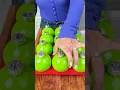 How to make grinch-inspired Christmas ornaments at home
