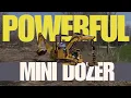 MAGNATRAC MH8500 Minidozer Working Drills Fence Post Holes Like a Pro