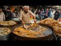 Download Lagu FAMOUS MUMBAI MASALA FRIED FISH PAKORA CRISPY FISH PAKODA RECIPE | KARACHI STREET FOOD PAKORA FAROSH