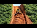 Download Lagu Extreme bulldozer earthmoving on mountain slope rugged terrain road grading and excavation
