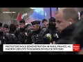 RAW VIDEO: Protestors Show Up In The Thousands Across Paris, France