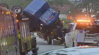 Diesel tanker truck overturns crews stopped thousands of gallons from leaking into water WSB-TV