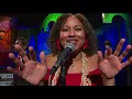 Robin Barnes performs "Celebrate Around the World" on the News With a Twist Stage