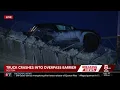 Vehicle left partially dangling over Interstate 93 overpass in Boston after crash