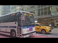 Both The Midtown Manhattan Bound SIM4C Express Bus and The x28 Express Bus