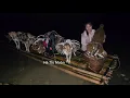Download Lagu Vietnamese girl with dog and goat rowing raft to catch fish with bamboo basket for living