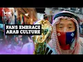 Download Lagu Qatar World Cup: Football fans and tourists embrace Arab \u0026 Qatari culture