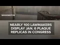 Nearly 100 lawmakers display Jan 6 plaque replicas in Congress