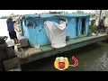 Download Lagu Kapal tunda mendorong tongkang melewati gerbang bendungan dengan spektakuler