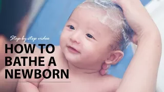 bathing a newborn baby with umbilical cord step by step video