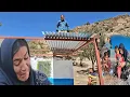 Download Lagu Nomadic lifea hard day in the heart of nature carrying materials with a wire rope and building a hut