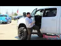 Jacked Up Trucks at Bayway RAM