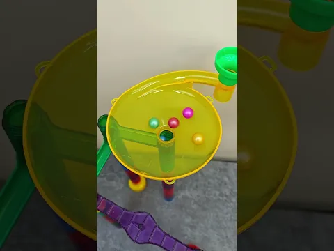 A Tiny World of Rolling Marbles