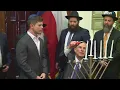 Abbott Jewish community members light Menorah at Texas Capitol