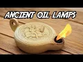 How were ancient oil lamps used