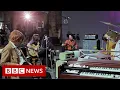 Download Lagu Unseen footage of The Beatles revealed in new documentary, directed by Peter Jackson - BBC News