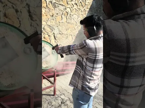 Shooting a Sand-Filled Barrel with a 9mm Glock
