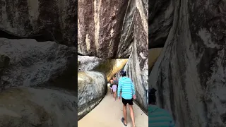 There’s a BEACH Under These Giant Boulders?! 🤯