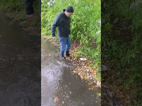 S#080-2 Unclogging a storm drain on a parking space after rain in Germany, #shorts