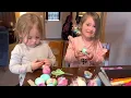 Sadie and Audrey decorate Easter eggs