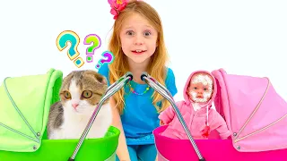 Nastya cuidando al gatito y al bebé.
