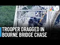 Trooper dragged during chase over Bourne Bridge