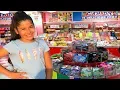 Annie pretends to play as candy maker toy store