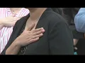 Newly naturalized citizens pledge allegiance to United States in Elkins