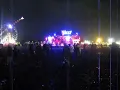 A guy mud sliding into a burger van V Festival 08 Stafford