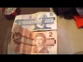 A 5 dollar bill and A 2 dollar bill from 1986