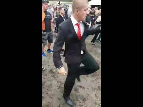 Download MP3 Guy looks out of place wearing a suit to a festival, until the beat drops | CONTENTbible