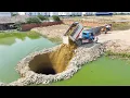 Download Lagu Great project that looks impressive, Bulldozer Mini pushes rocks to build flooded roads \u0026 5T trucks