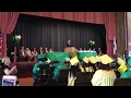 Clinton Sup sings to students at graduation