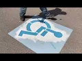 HOW MUCH DO YOU CHARGE FOR A PARKING LOT STRIPING JOB ADA SYMBOLS AND ACCESS ISLES