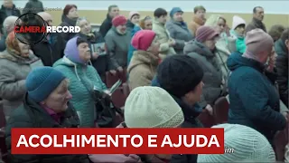 Veja como é o trabalho do casal Rafael e Mariana Bagatoli em cidade devastada pela guerra