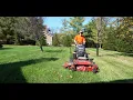 Mowing back yard with Exmark Turf Tracer 48