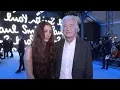 Jimmy Page and Scarlett Sabet front row at Paul Smith Fashion Show