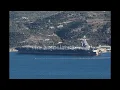 Photos show US aircraft carrier USS Gerald R Ford docked at naval base on Greek island of Crete
