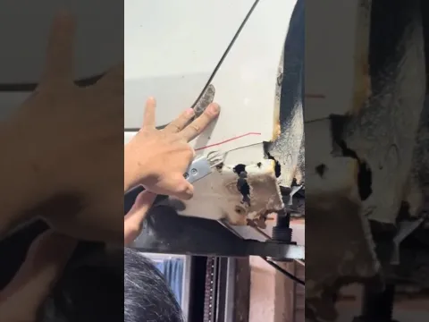 Welding repair of a lower body panel damaged by rust