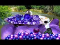 Open the purple giant clam filled with precious purple pearls so beautiful that it s intoxicating