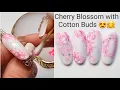 Impress your clients with this nail art hack Sakura Cherry blossom nail art with cotton buds