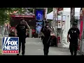 MANHUNT Police search for second suspect after Seattle bloodshed