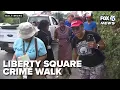 Liberty Square residents demand crackdown after elderly man beaten outside 7-Eleven