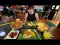 Eating Indian Food - Banana Leaf Platter