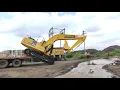 Excavator Unloading from Trailer Komatsu PC210-10 New Machine Excavator Unloading Without Ram