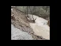 Water rushing through Jubilee Court in Tuolumne County Raw