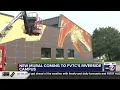 New mural on Oshkosh s Riverwalk trail