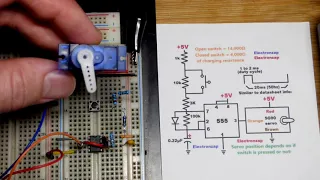 2 position SG90 servo circuit using 555 timer and push button switch schematic diagram