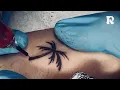 Tattoo real-time tattooing a free hand sketch small palm tree minimalist tattoo